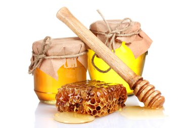 Two jars of honey, honeycombs and wooden drizzler isolated on white clipart