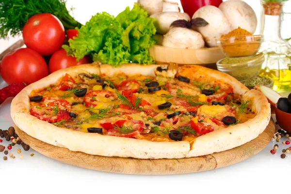 Delicious pizza on wooden board, vegetables, spices and oil isolated on whi — Stock Photo, Image