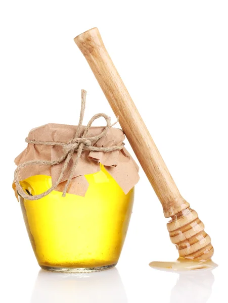 Egy üveg méz és fából készült szitáló, fehér alapon elkülönítve. — Stock Fotó