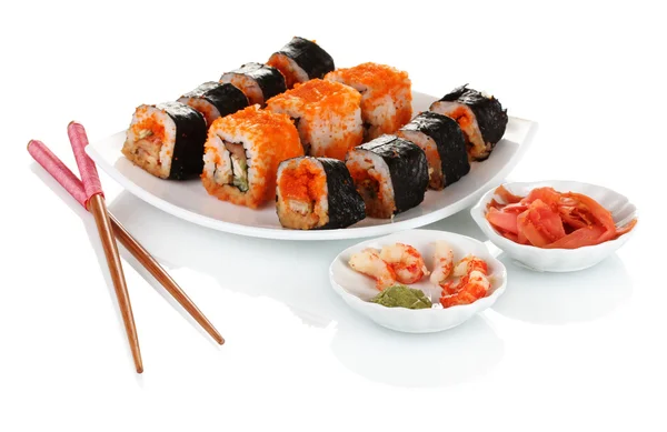 Pyszne sushi na płytkę, pałeczki, sos, ryby i krewetki na w tle — Zdjęcie stockowe