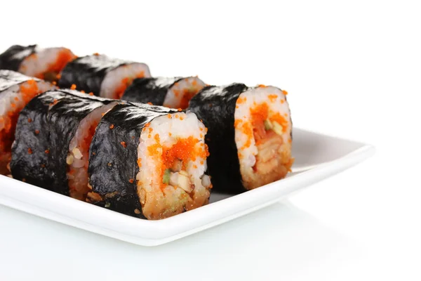 Lahodné sushi na desce izolovaných na bílém — Stock fotografie