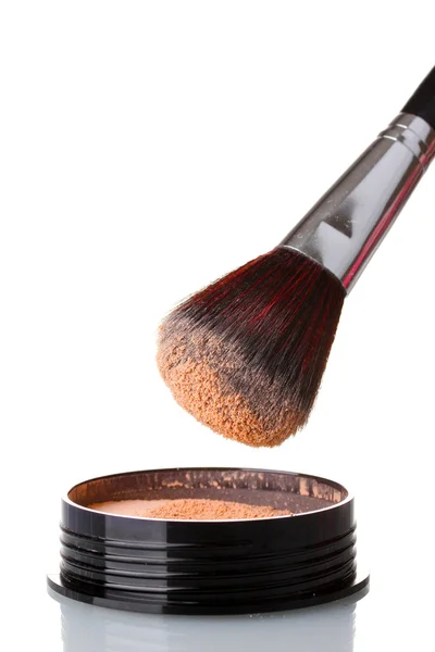 Closeup of face powder and brush isolated on white — Stock Photo, Image