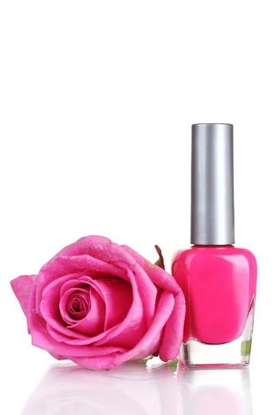Rosa nagellack med ros på vit bakgrund — Stockfoto