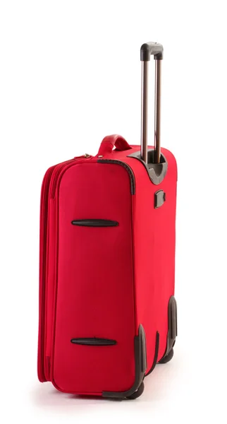 Червона валіза ізольована на білому — стокове фото