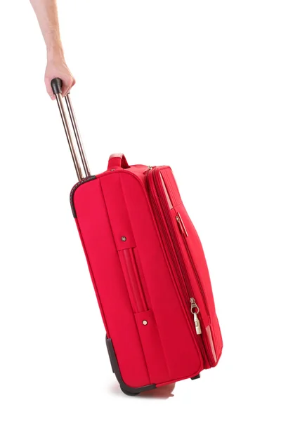 Rode koffer geïsoleerd op een witte — Stockfoto