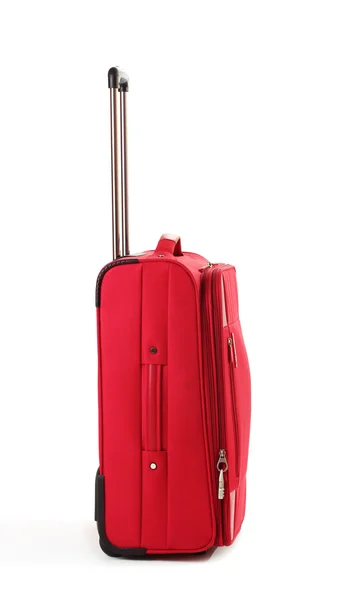 Röda resväska isolerad på en vit — Stock fotografie
