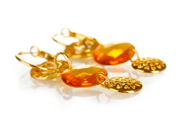 Earrings with yellow stone isolated on the white — Φωτογραφία Αρχείου