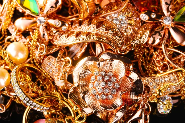 Várias jóias de ouro closeup — Fotografia de Stock