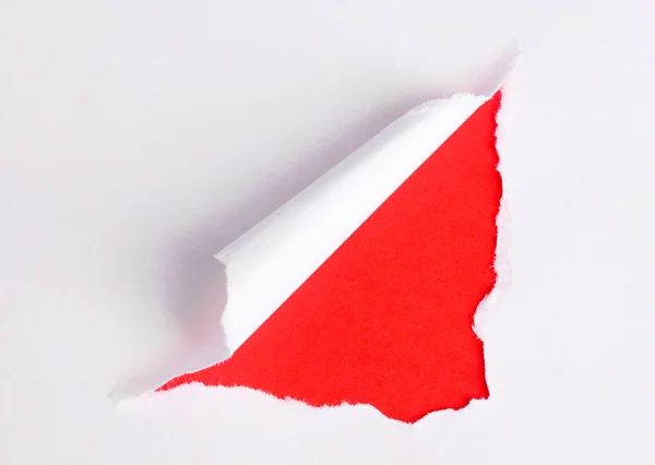 Papier déchiré avec fond rouge — Photo