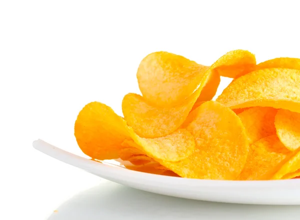 Delicious potato chips on plate isolated on white — Stock Photo, Image
