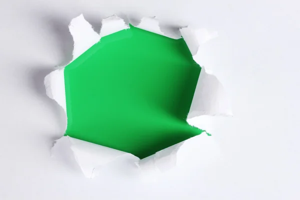 Torn księga z zielonym tle — Zdjęcie stockowe