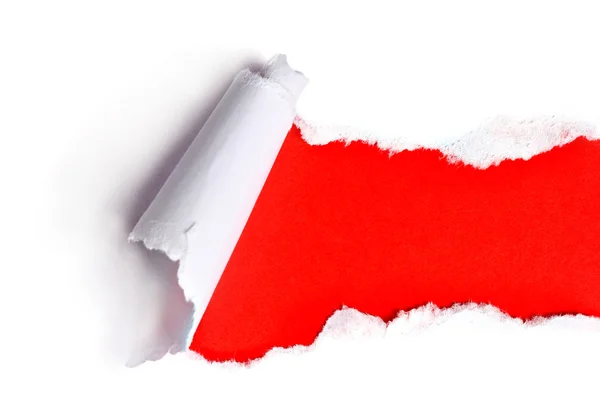 Gescheurd papier met rode achtergrond — Stockfoto