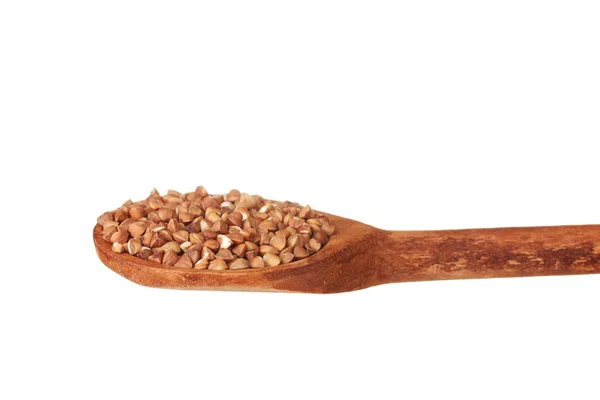 Cucchiaio di legno con grano saraceno grezzo isolato su bianco — Foto Stock