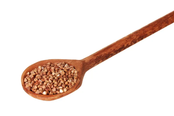 Wooden spoon with raw buckwheat isolated on white — Stock Photo, Image
