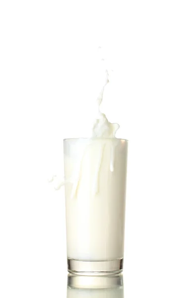 Glass of milk with a splash isolated on white — Stock Photo, Image