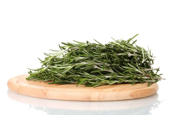 Fresh green rosemary on wooden board isolated on white — Stock Photo, Image