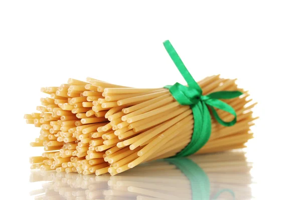 Bunch of spaghetti with ribbon — Stock Photo, Image