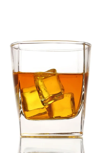 Glass of scotch whiskey and ice isolated on white — Stock Photo, Image