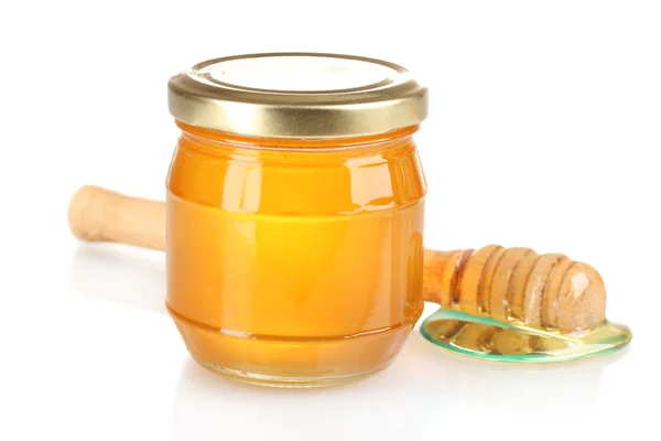 Jar of honey and wooden drizzler isolated on white Stock Photo