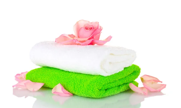 Towel and flower isolated on white Stock Picture