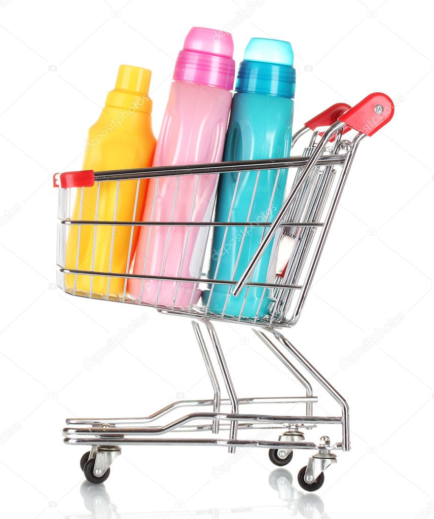 Shopping cart and detergent isolated on white