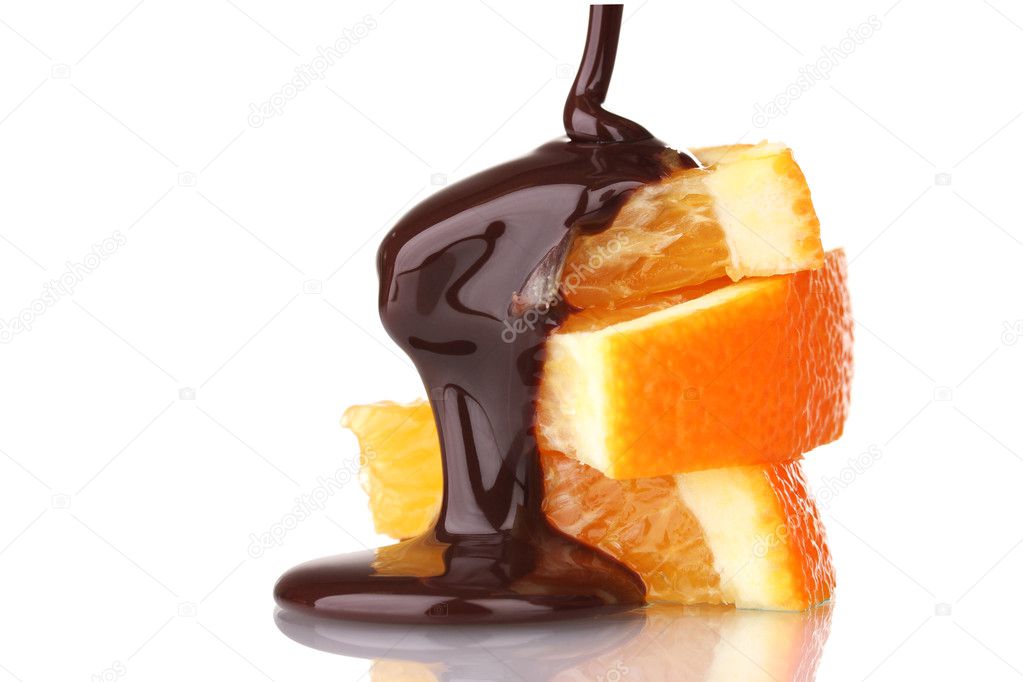 Sliced ​​ripe orange with chocolate