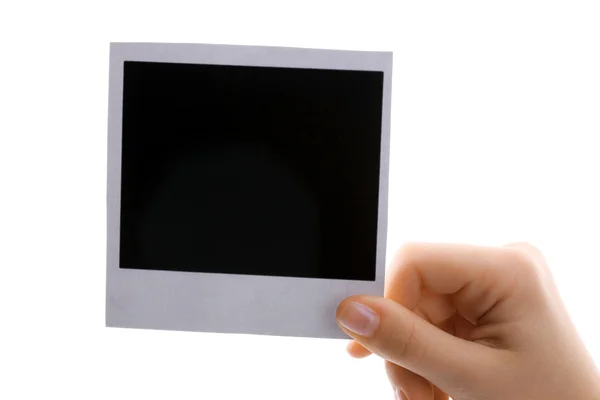 Φωτογραφικό χαρτί στο χέρι που απομονώνονται σε λευκό — Φωτογραφία Αρχείου