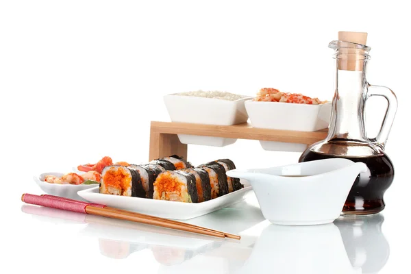 stock image Delicious sushi on plate, chopsticks, soy sauce, fish and shrimps isolated