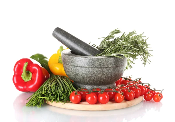 Rosemary in mortar, tomatoes cherry on wooden board, paprika and green onio — Stock Photo, Image