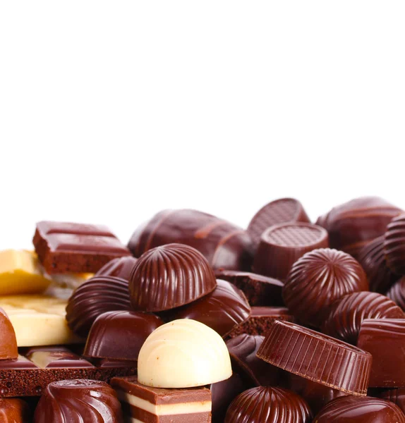 stock image Many different chocolate candy isolated on white