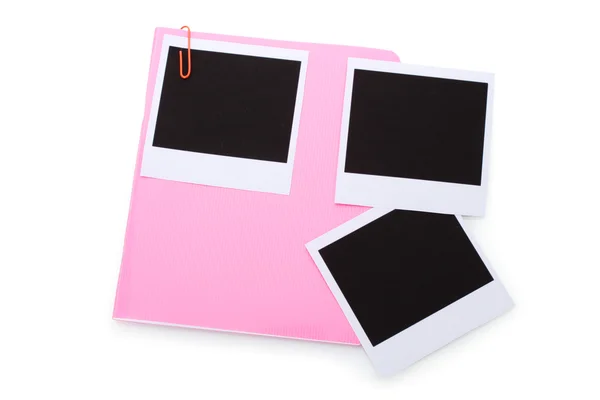Photo papers and pink notebook isolated on white — Stock Photo, Image