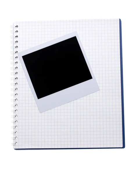 Φωτογραφικό χαρτί και σημειωματάριο που απομονώνονται σε λευκό — Φωτογραφία Αρχείου
