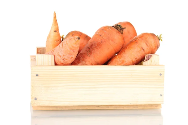 stock image Raw carrots in wooden box isolated on white