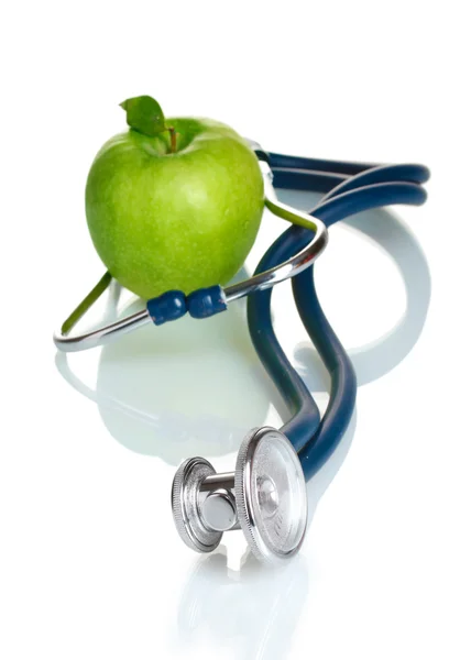 Ιατρική στηθοσκόπιο και πράσινο μήλο που απομονώνονται σε λευκό — Φωτογραφία Αρχείου