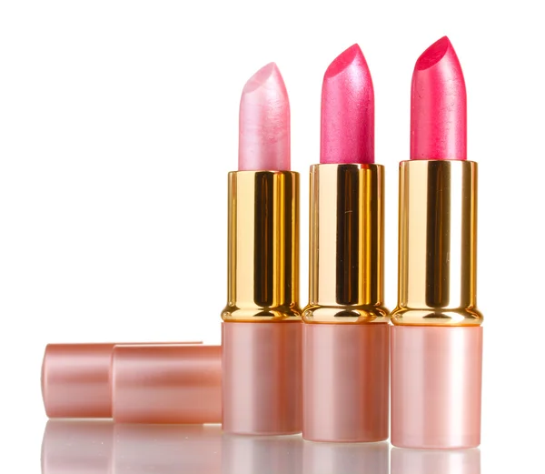Hermosos lápices labiales rosados aislados en blanco —  Fotos de Stock