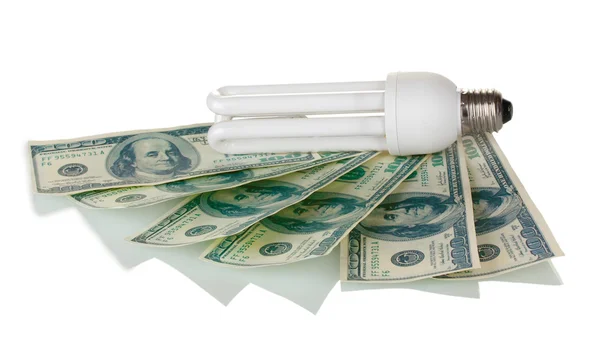 Energiatakarékos lámpa és a pénz elszigetelt fehér — Stock Fotó