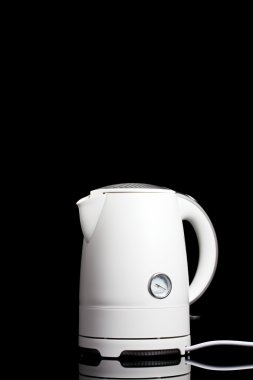 White electric kettle on black clipart