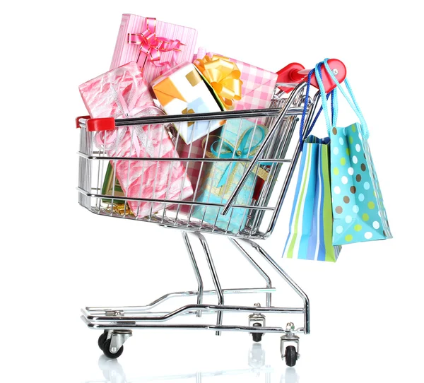 Shopping cart with bright gifts and paper bags isolated on white — Stock Photo, Image