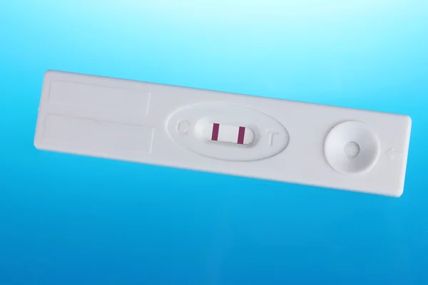 stock image Pregnancy test on blue background