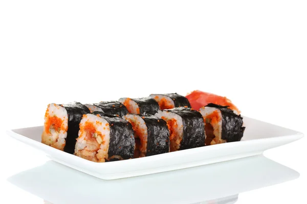 Delicioso sushi na placa isolado no branco — Fotografia de Stock