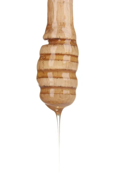 Trä honung skopa med honung isolerad på vit — Stockfoto