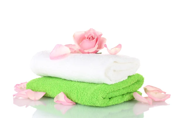 Towel and flower isolated on white — Stock Photo, Image