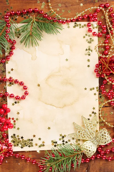 Christmas card on wooden table — Stock Photo, Image