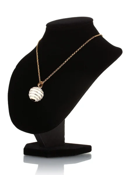 Pendant in form of ball with gem on mannequin isolated on white — 图库照片