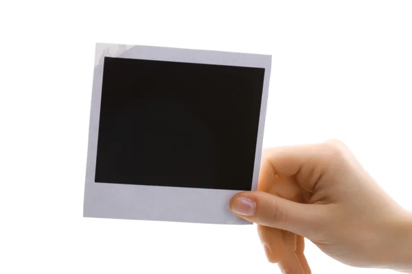 Фотопапір в руці ізольовано на білому — стокове фото