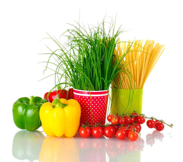 Green onion and spaghetti in cups, paprika and tomatoes cherry isolated on — Stock Photo, Image