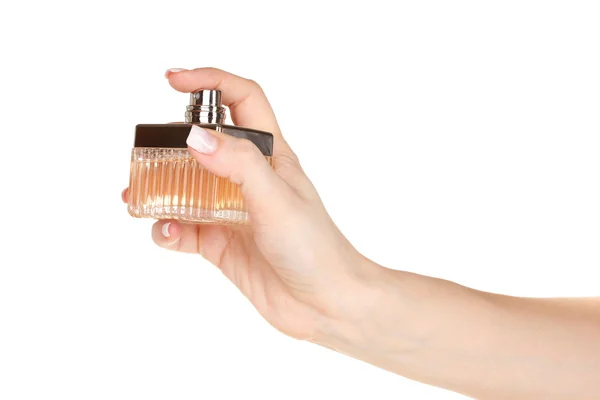 Kobiety w rękę i butelki perfum na białym tle — Zdjęcie stockowe