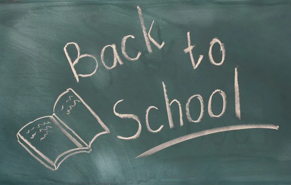 Back to school written on green chalkboard — Stock Photo, Image