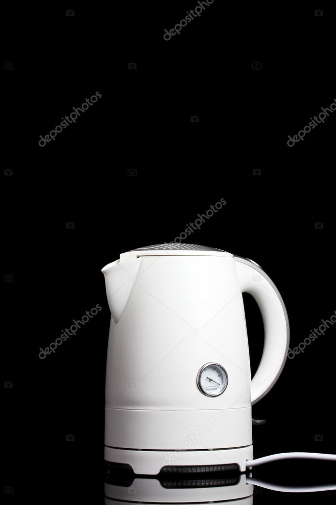 White electric kettle on black