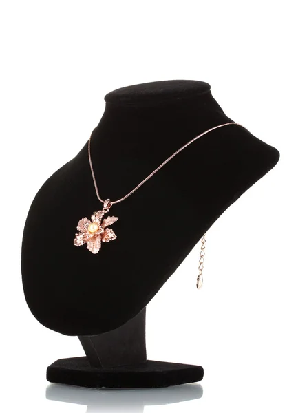 Pendant in form of flower on mannequin isolated on white — Stock Photo, Image